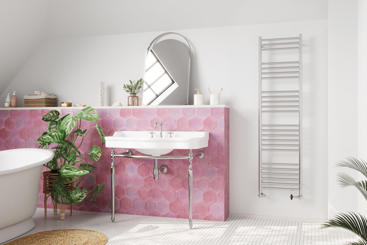 Vertical Radiator in a Bathroom with Pink Tiles