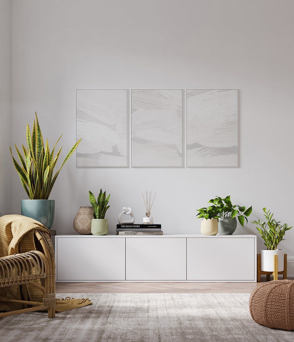 Photorealistic 3D rendering of a minimalist living space with indoor plants, a white console table, and neutral decor elements.
