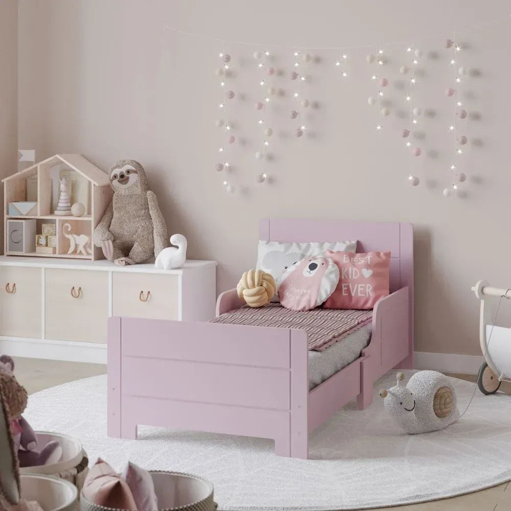 3D visualization of children’s bedroom with pink bed, soft toys, and string lights on pastel wall