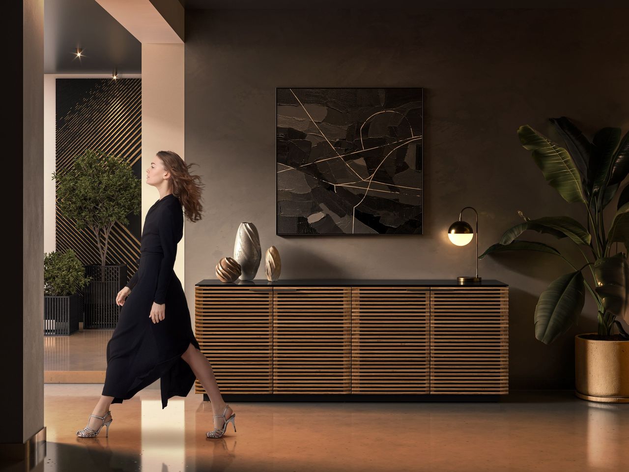 Product Render with a Woman Passing a Media Console