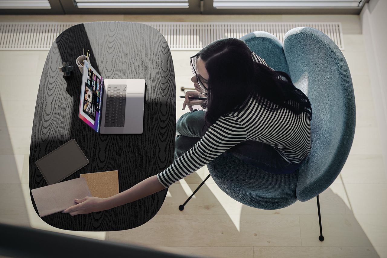 Product CG Render with a Girl using a Laptop