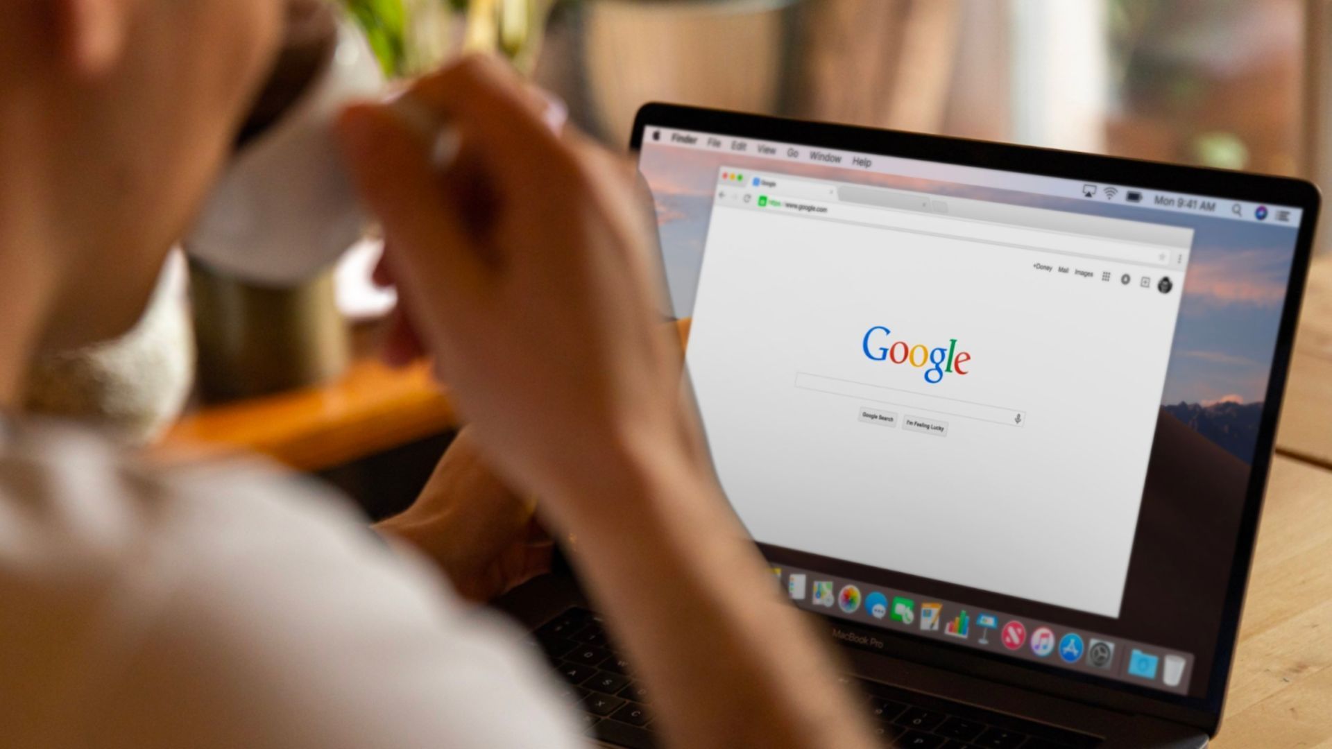 A user browsing on a laptop with a search engine, symbolizing the rise of voice-activated shopping as a significant e-commerce trend, demonstrating the evolving consumer preference for convenient and hands-free online shopping experiences.