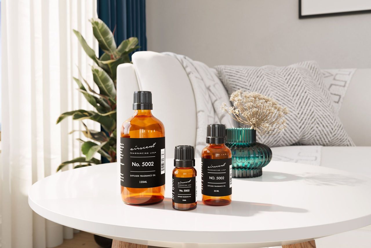 Fragrance Bottles Group Shot on a Coffee Table