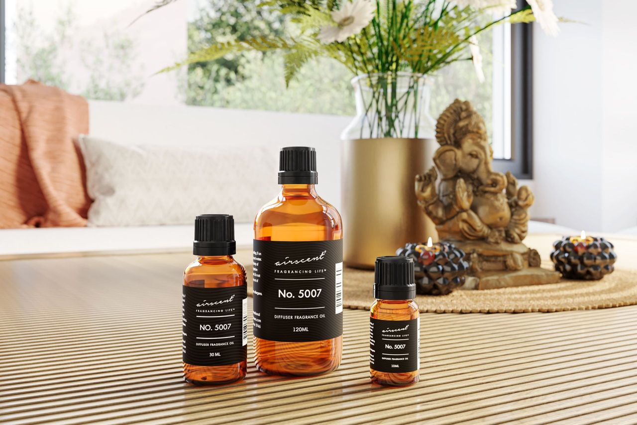 Fragrance Bottles Group Shot Near a Vase