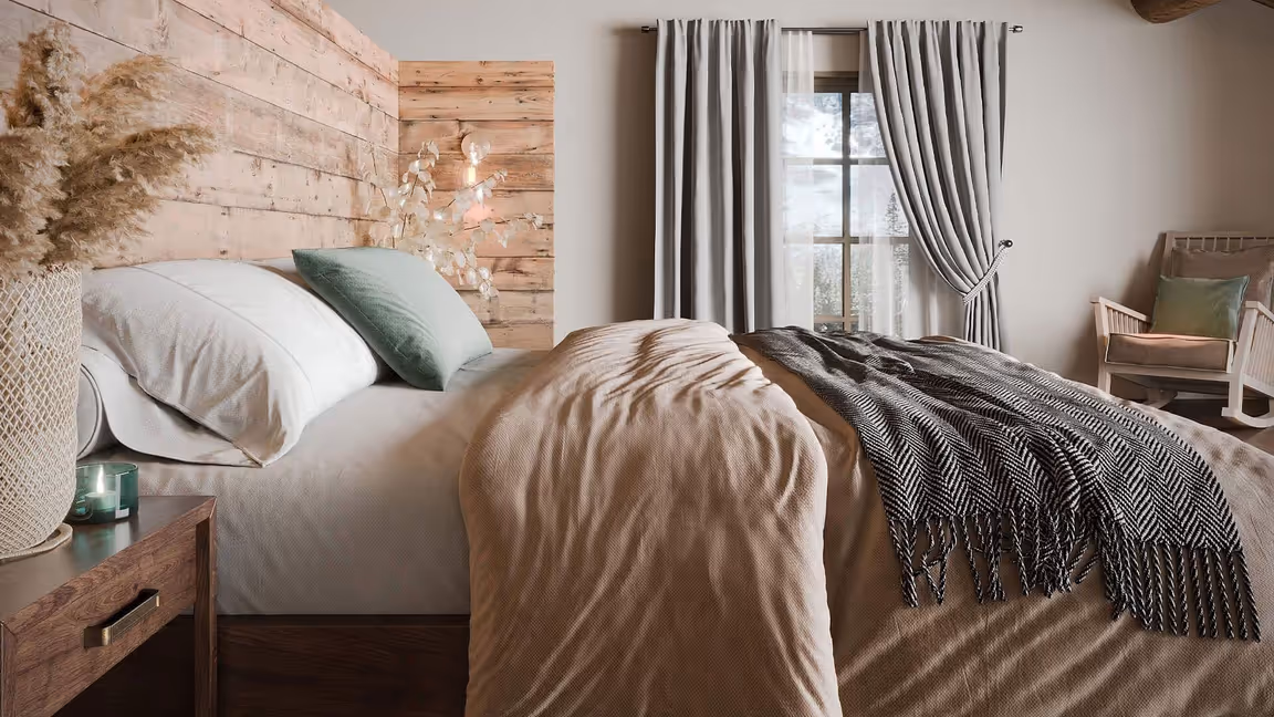 3D visualization of a bedroom with wood headboard, neutral bedding, and hardware details on the nightstand drawer