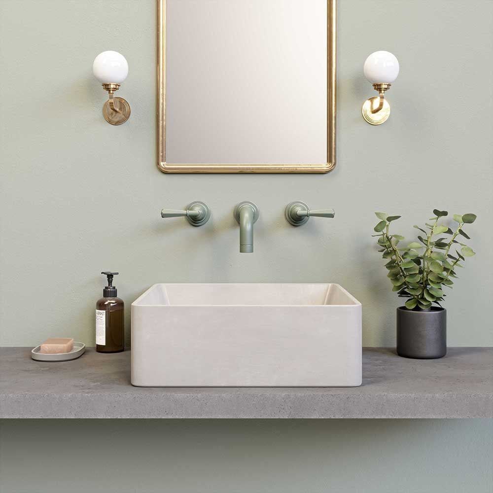 Minimalist Bathroom Sink With Green Fixtures And Gold Mirror Portrayed In A Polished 3D Visualization