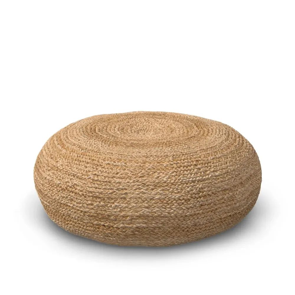 Product imagery for catalogs showing a round woven pouf in natural fiber