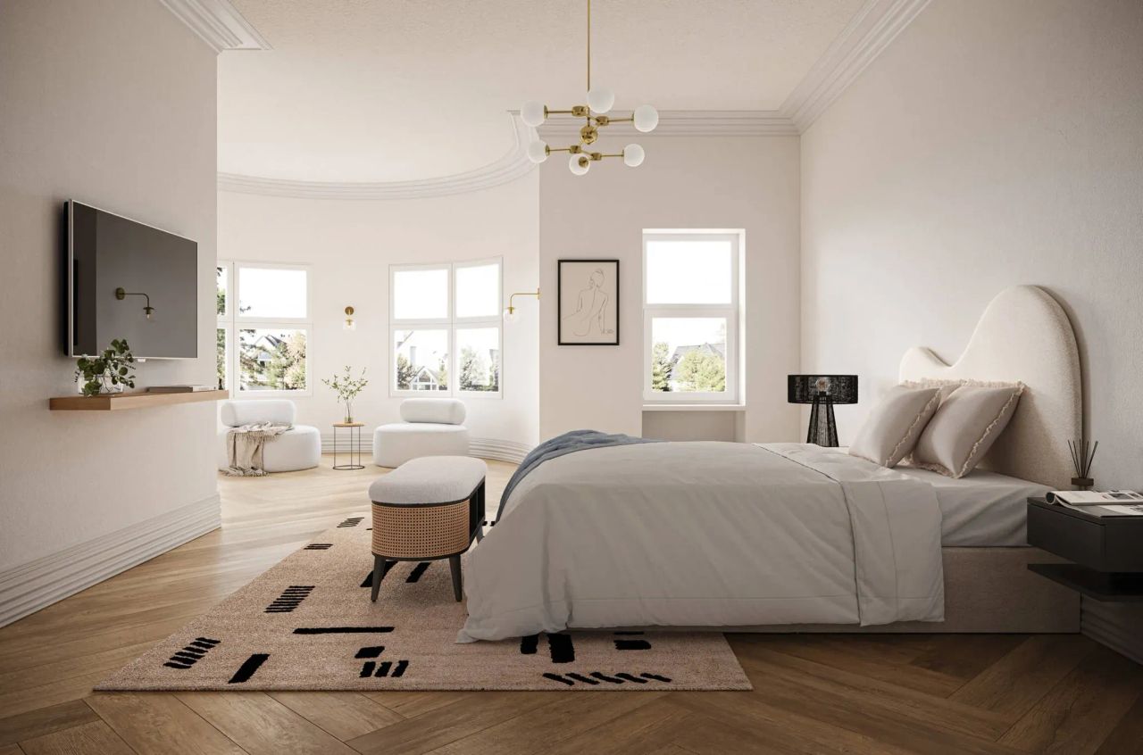 3D visualization of modern bedroom with upholstered bed, TV, armchairs, rug, and wooden floor