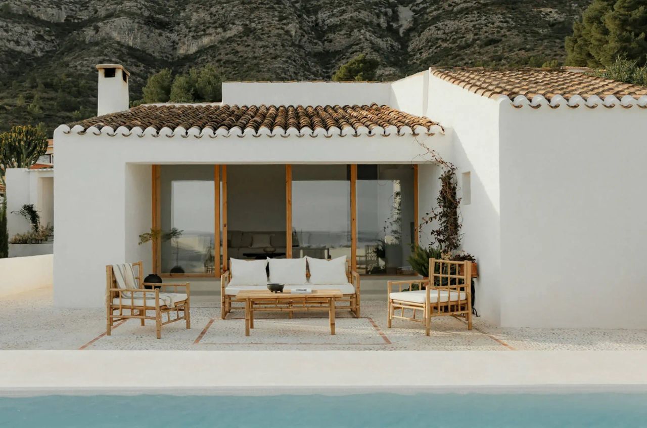 Outdoor furniture Items CG rendering with wooden seating and coffee table by the pool